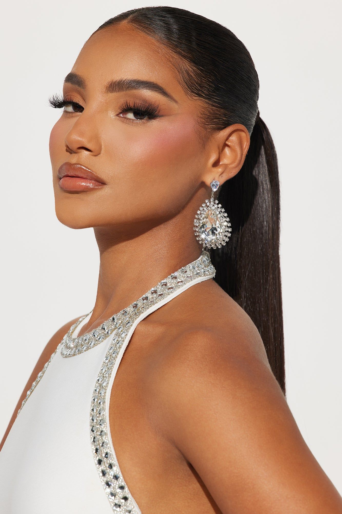 Covered In Rhinestones Earrings - Silver sold by Fashion Nova product image thumbnail 2