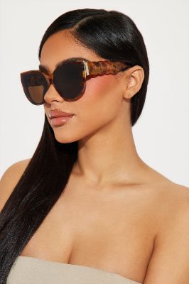 A Little Catty Sunglasses - Tortoise sold by Fashion Nova