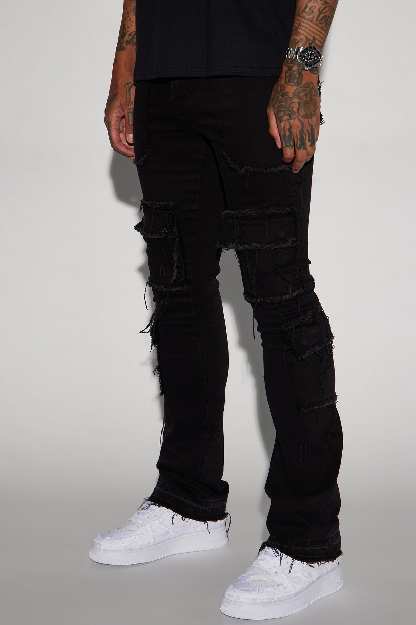 We In This Chained Stacked Skinny Flare Jeans - Black sold by Fashion Nova
