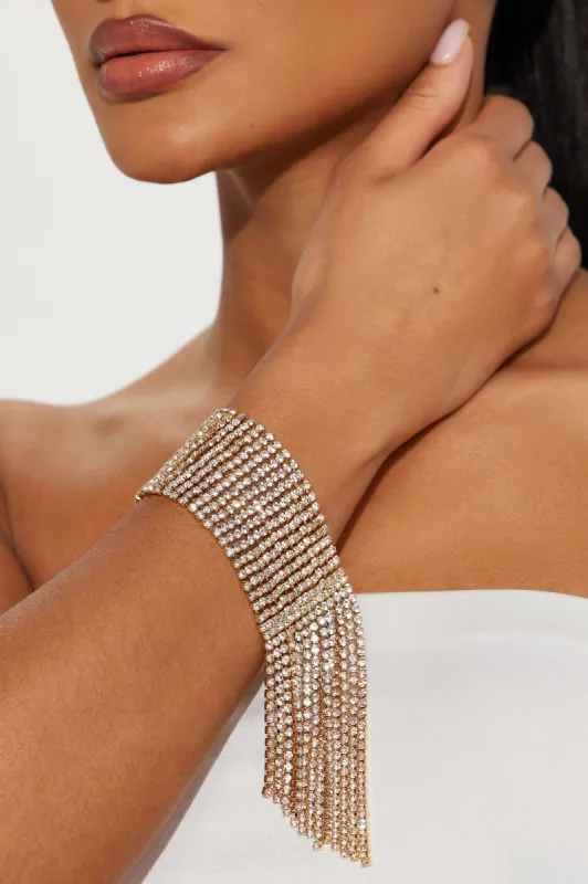Fergie Fringe Bracelet - Gold sold by Fashion Nova