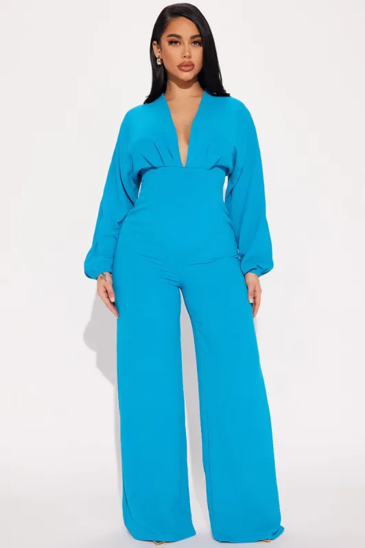 Miriam Jumpsuit - Turquoise sold by Fashion Nova