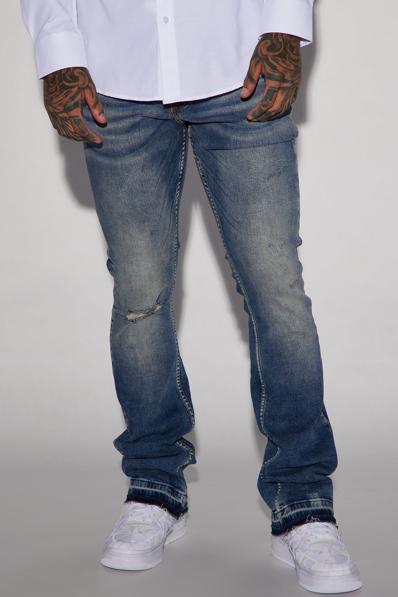Can't Relate Distressed Stacked Skinny Flare Jeans - Medium Blue Wash sold by Fashion Nova