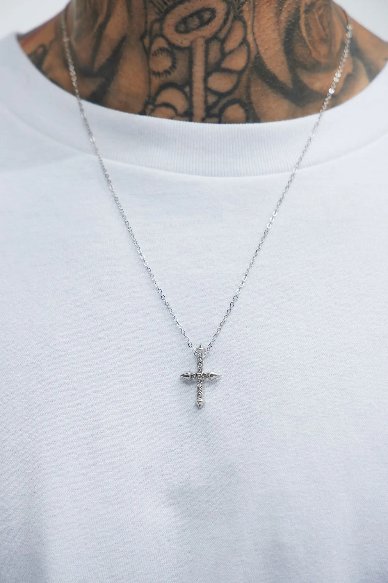 Iced Out Spiked Cross Necklace - Silver sold by Fashion Nova