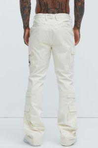 Nikko Slim Flare Pants - Cream sold by Fashion Nova