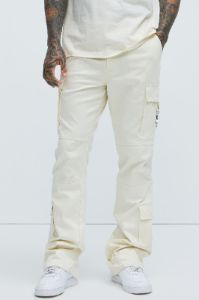 Nikko Slim Flare Pants - Cream sold by Fashion Nova