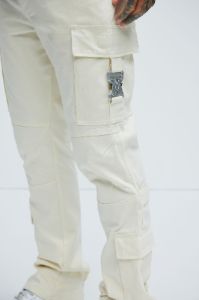 Nikko Slim Flare Pants - Cream sold by Fashion Nova