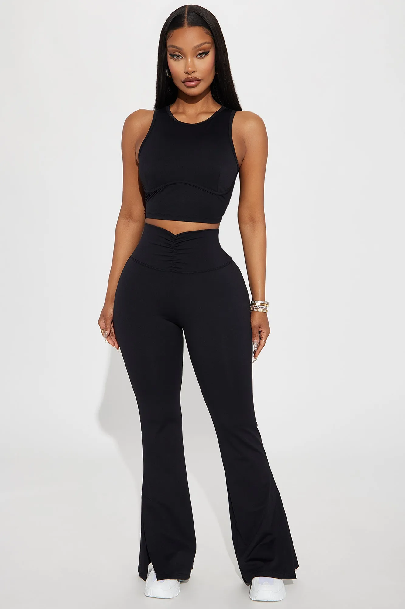 Pilates Girl Active Flare Pant - Black sold by Fashion Nova