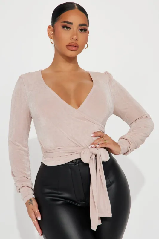 Harper Surplice Top - Stone sold by Fashion Nova