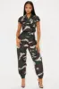Playing Straight Up Camo Jumpsuit - Olive/combo sold by Fashion Nova