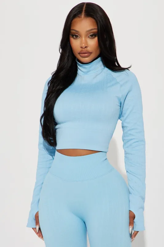 Wonderland Cable Knit Active Top - Light Blue sold by Fashion Nova