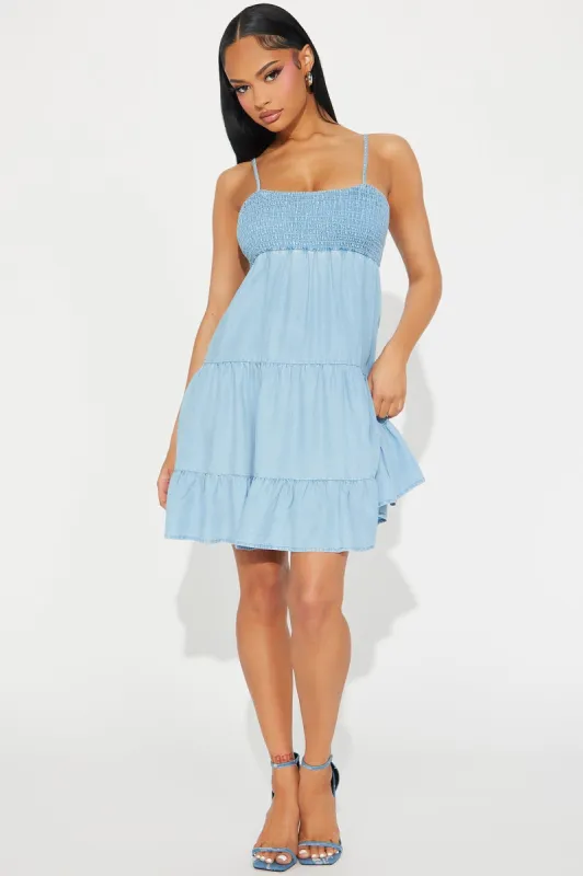 Elisa Tiered Mini Dress - Light Wash sold by Fashion Nova