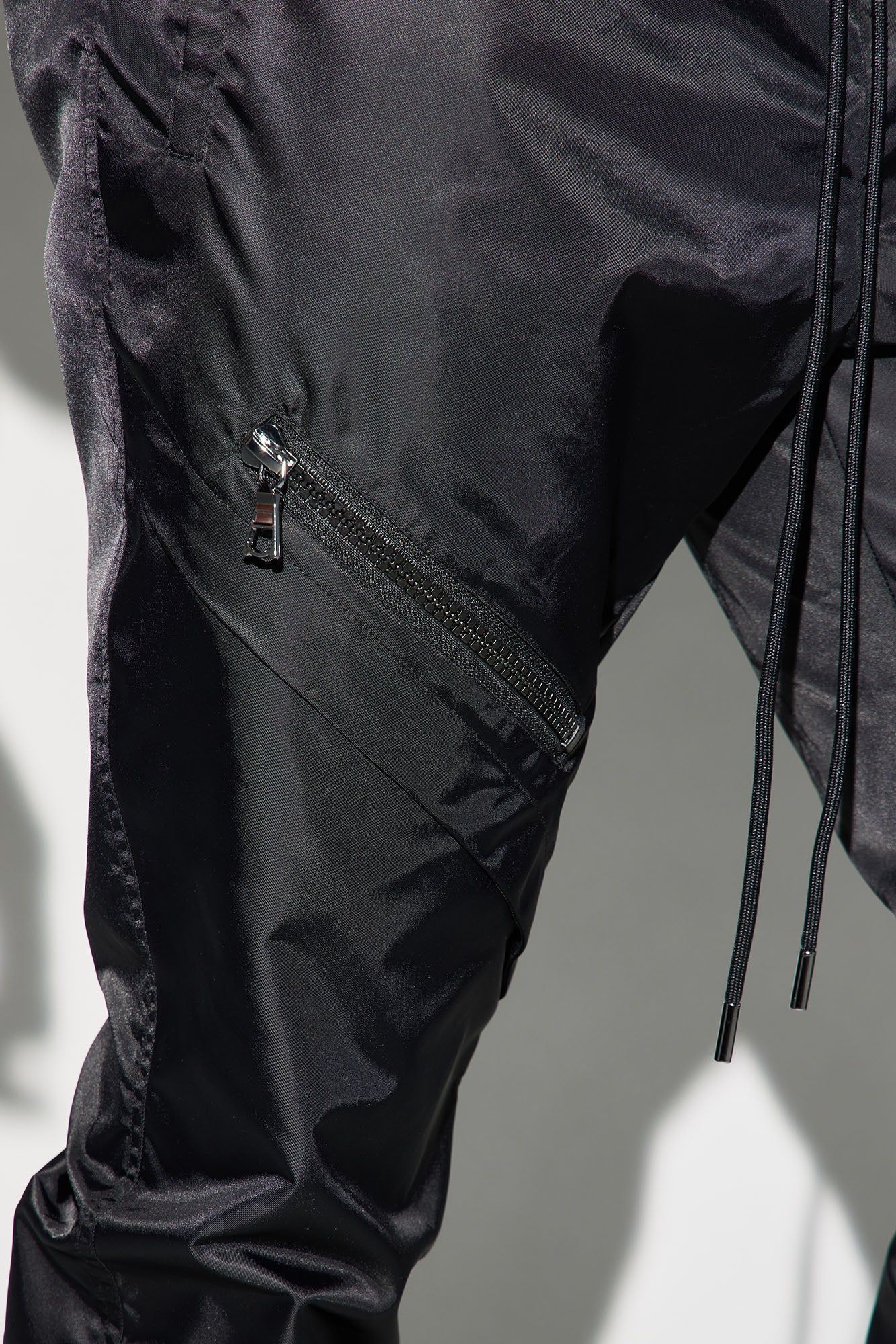 Play The Track Stacked Slim Flare Nylon Pants - Black sold by Fashion Nova product image thumbnail 4