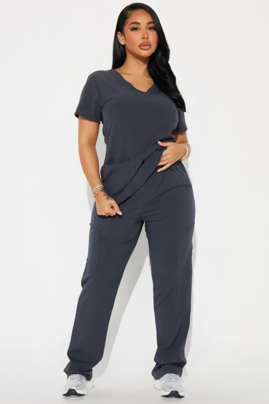 Working Overtime 4FLEX Uniform Scrub Pants - Charcoal sold by Fashion Nova