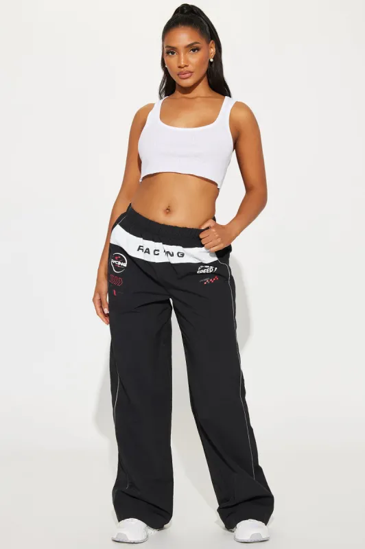 Gaining Momentum Windbreaker Pant - Black sold by Fashion Nova