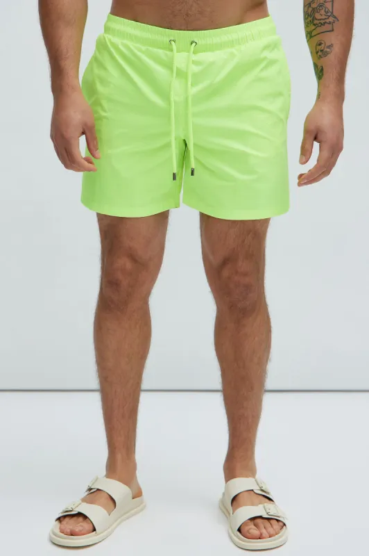 Montez Stretch Swim Trunk Mid - Neon Yellow sold by Fashion Nova