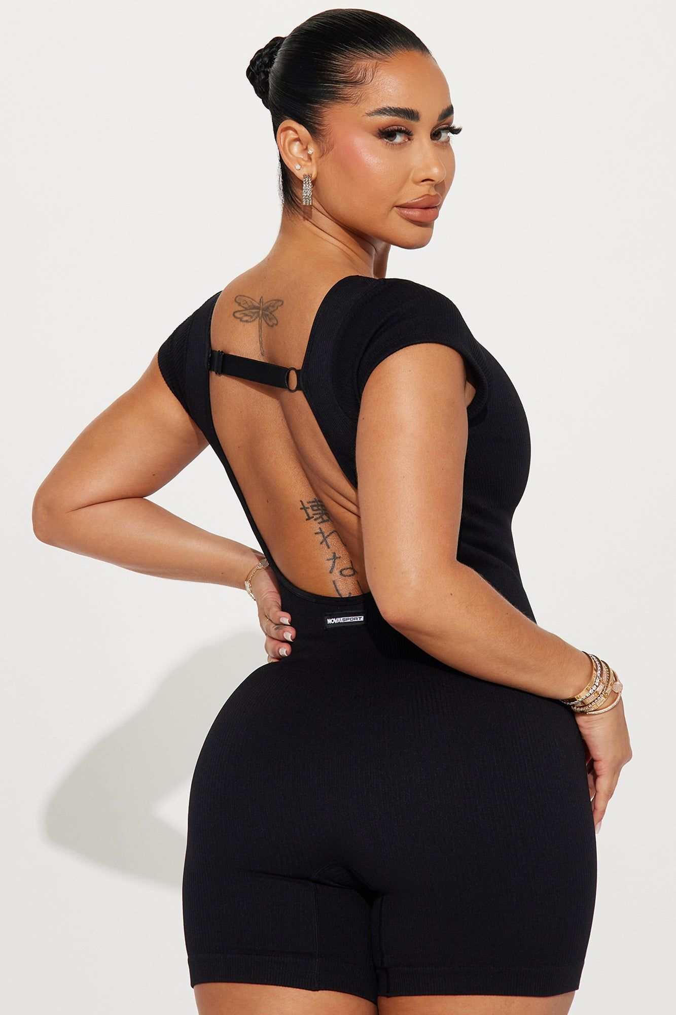 Plie Seamless Ribbed Active Romper - Black sold by Fashion Nova product image thumbnail 2
