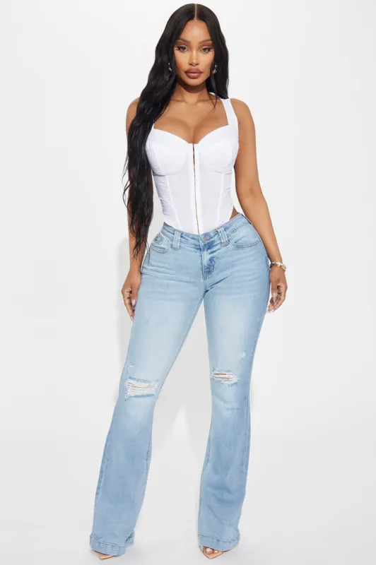 Checking It Out Stretch Flare Jeans - Light Wash sold by Fashion Nova