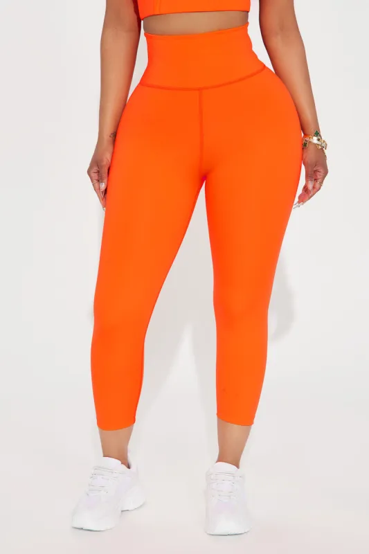 Run It Up Elevate Capri Active Legging - Neon Orange sold by Fashion Nova