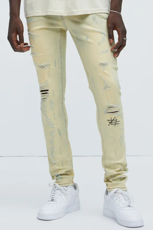 Get Stitches Ripped Skinny Jeans - Light Wash made by Fashion Nova