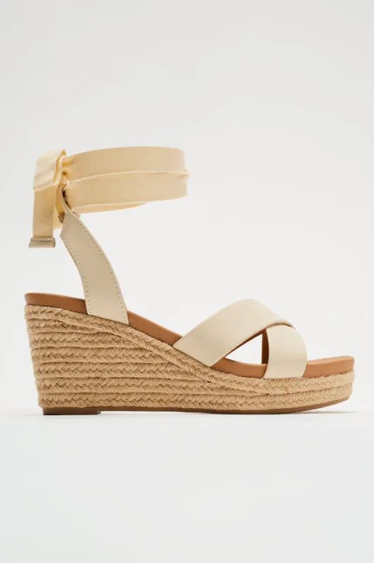Stefanie Wrap Up Wedges - Beige sold by Fashion Nova