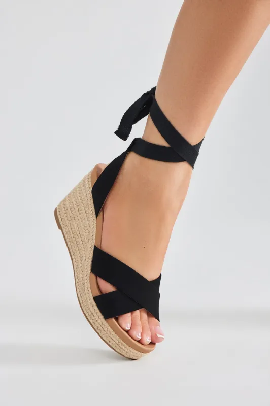 Stefanie Wrap Up Wedges - Black sold by Fashion Nova