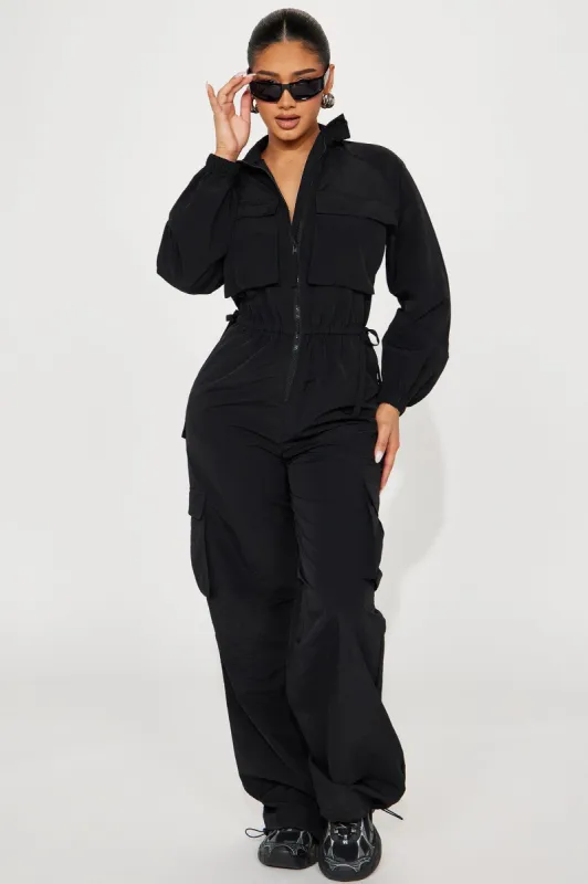 Don't Mention It Windbreaker Jumpsuit  - Black sold by Fashion Nova