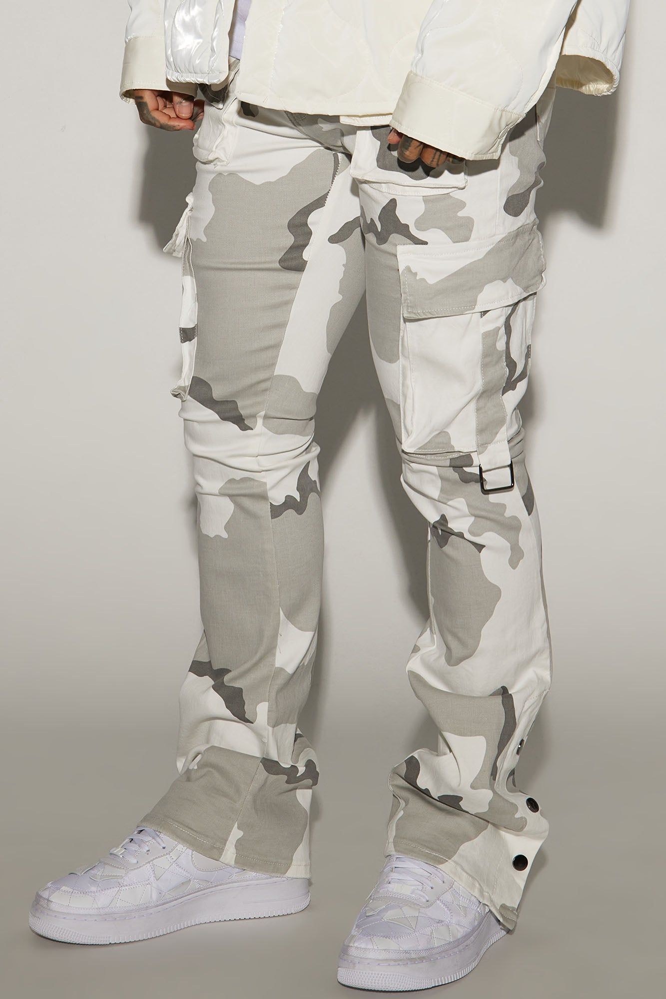 Bring The Vibe Stacked Skinny Snap Flare Pants - Grey/combo sold by Fashion Nova