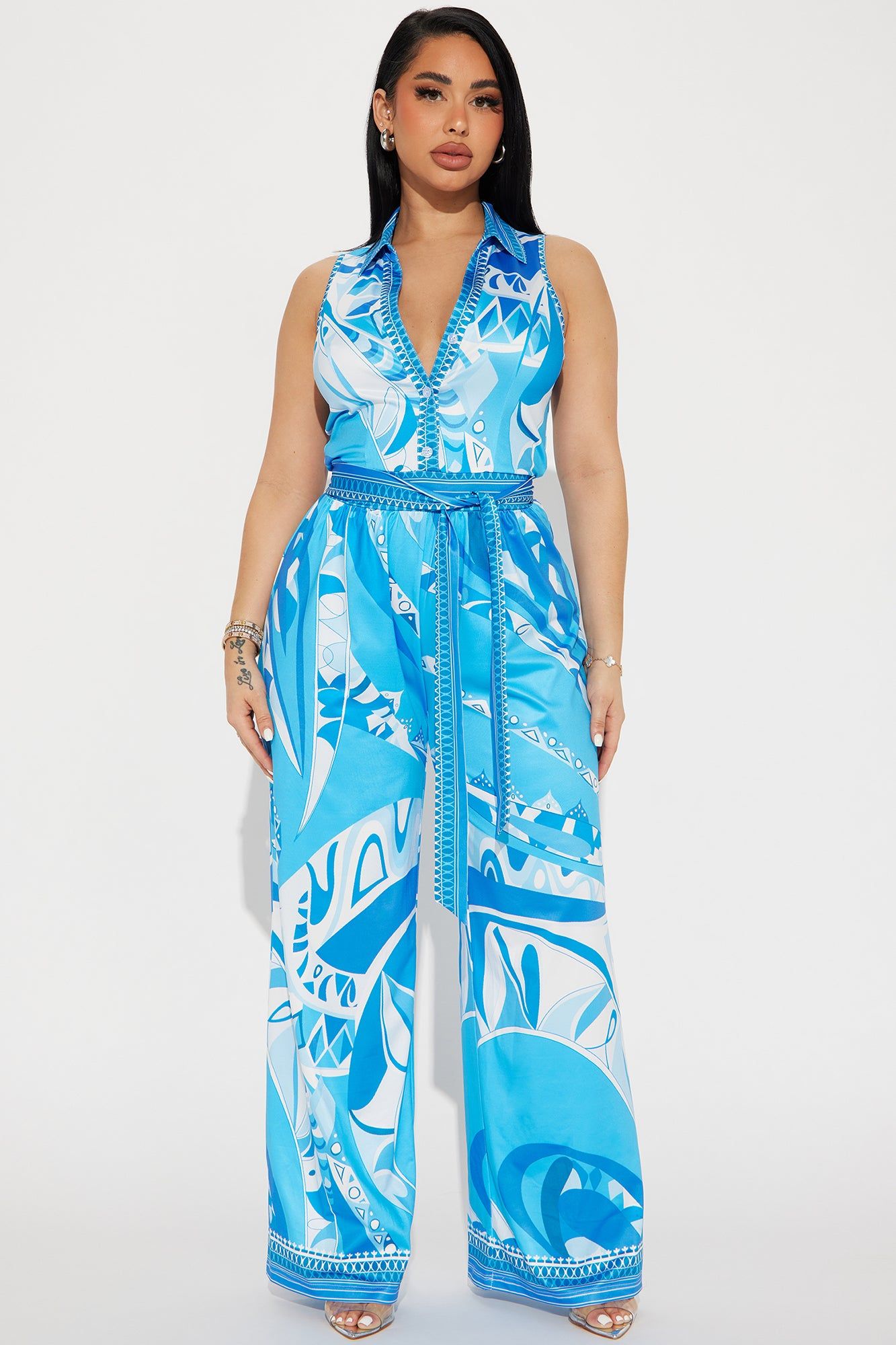 This Energy Jumpsuit - Blue/combo sold by Fashion Nova