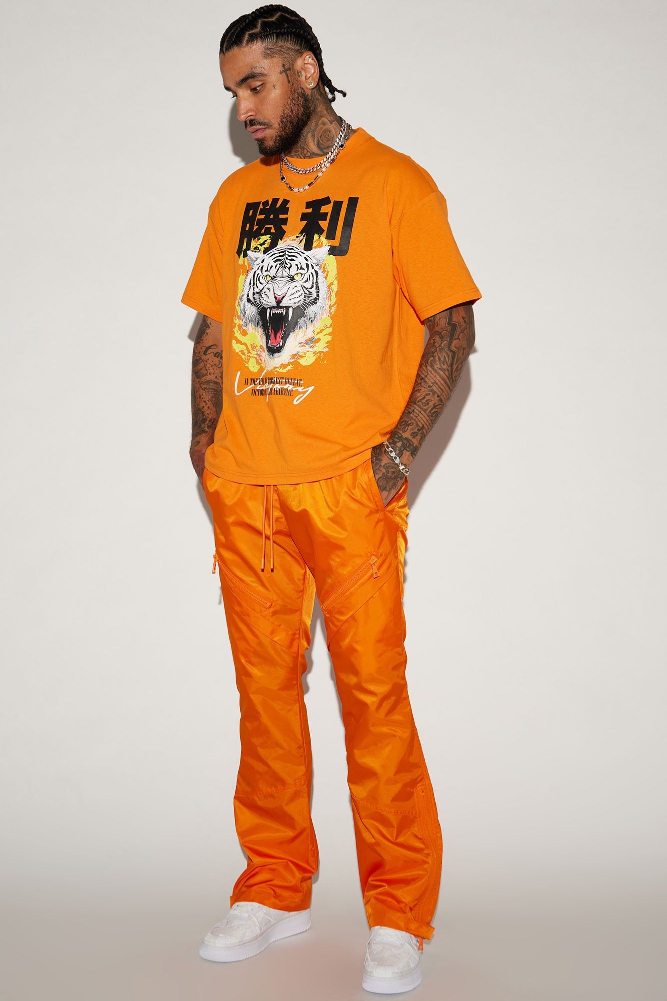 Play The Track Stacked Slim Flare Nylon Pants - Orange sold by Fashion Nova product image thumbnail 3