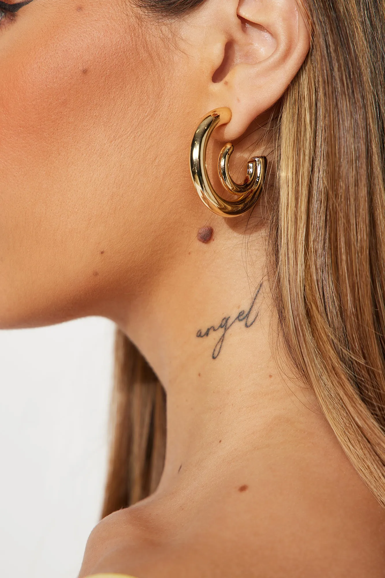 Turn Around Earrings - Gold sold by Fashion Nova