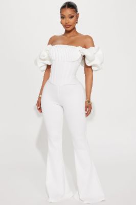 Dreaming In Ruffles Jumpsuit  - White sold by Fashion Nova