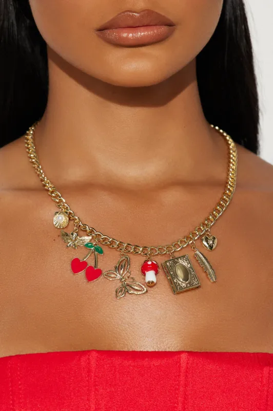 Treasure - Gold/Red sold by Fashion Nova