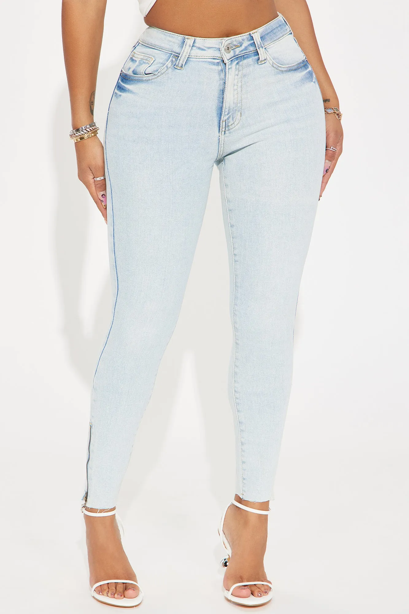 Just Hits Different Stretch Zip Hem Skinny Jeans - Light Wash sold by Fashion Nova