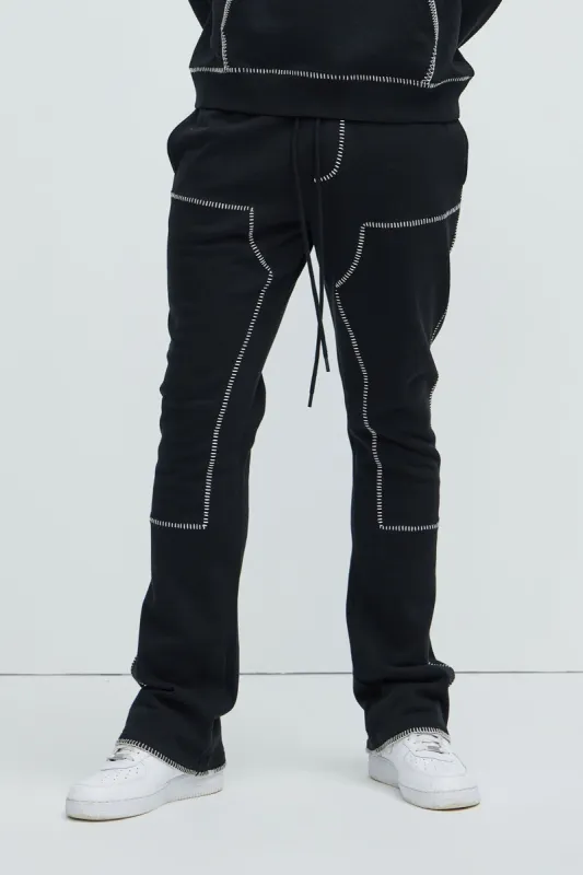 Tyson Stitch Skinny Flared Sweatpants - Black sold by Fashion Nova