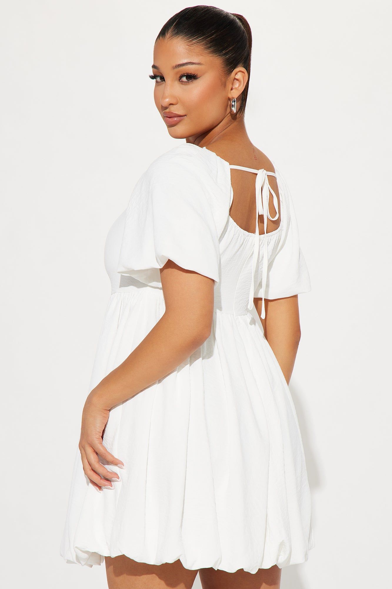 Gwen Babydoll Mini Dress - White sold by Fashion Nova product image thumbnail 3