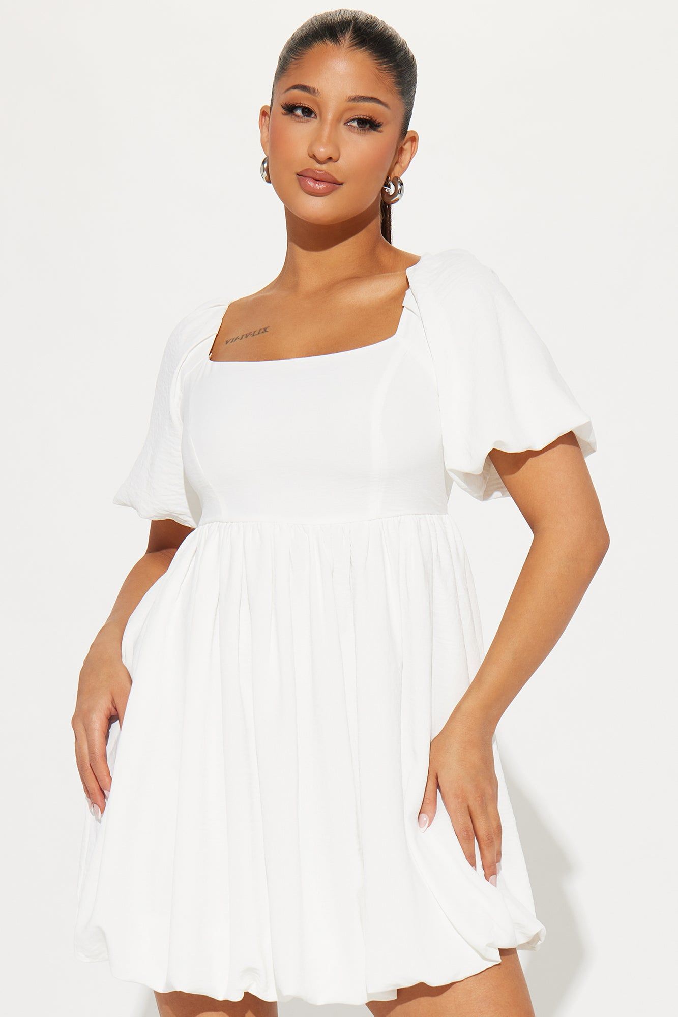 Gwen Babydoll Mini Dress - White sold by Fashion Nova product image thumbnail 2