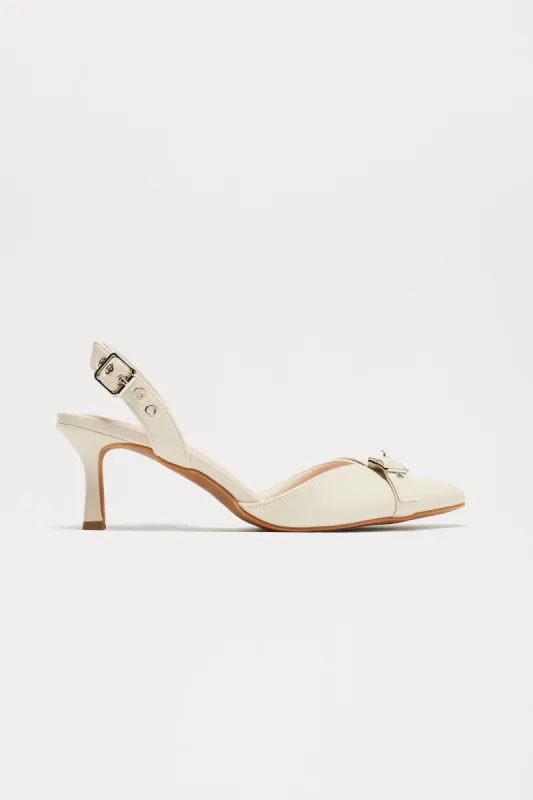 Chandler Buckle Pumps - Ivory sold by Fashion Nova