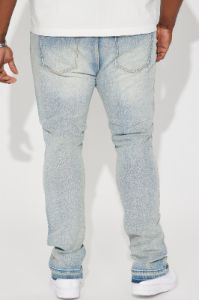 Torn Apart Stacked Skinny Flare Jeans - Light Blue Wash sold by Fashion Nova