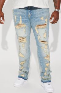 Torn Apart Stacked Skinny Flare Jeans - Light Blue Wash sold by Fashion Nova