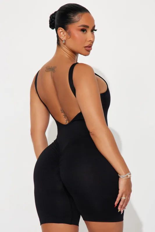 Stay Grounded Active Romper - Black sold by Fashion Nova
