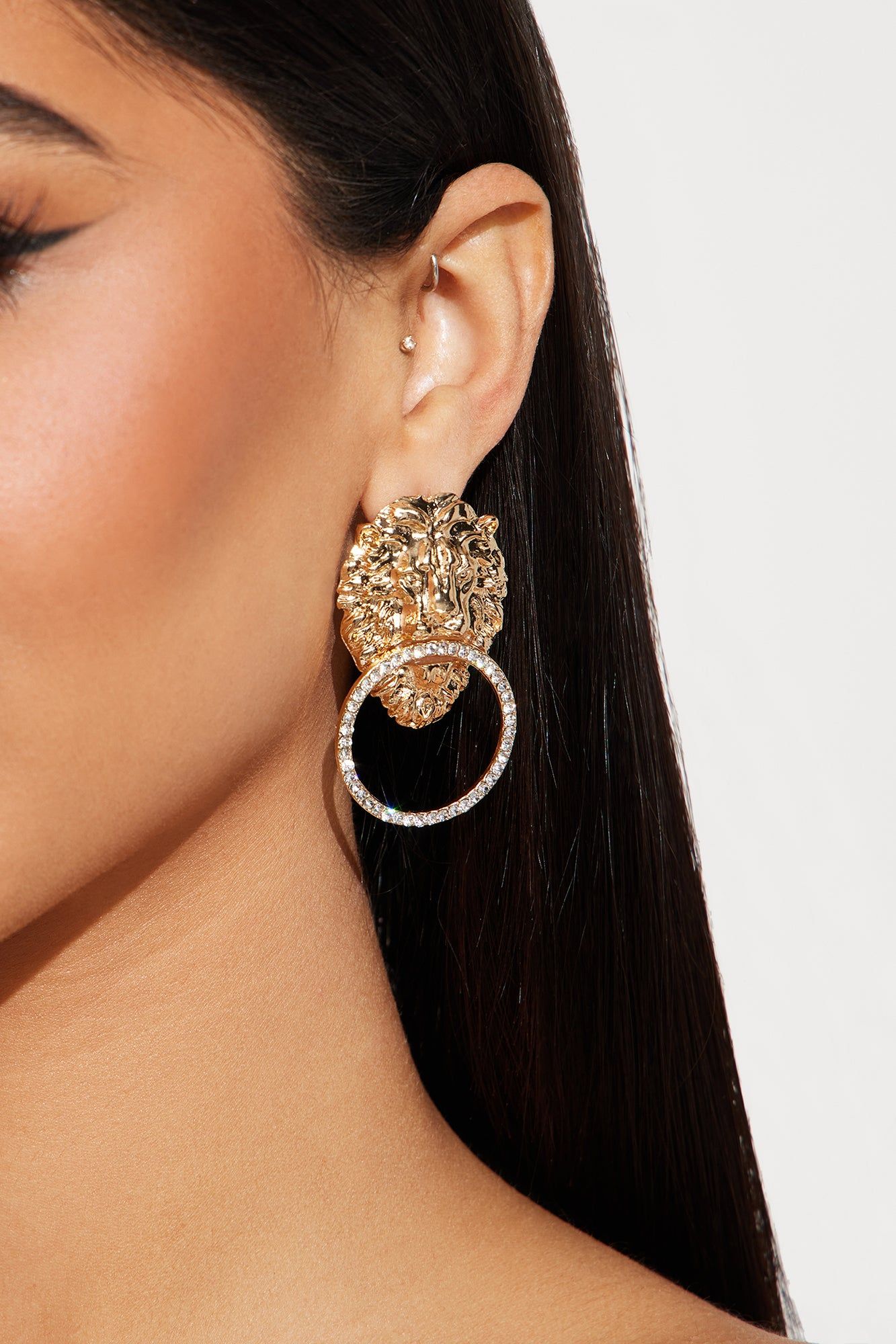 Heart Of A Lion Earrings - Gold sold by Fashion Nova