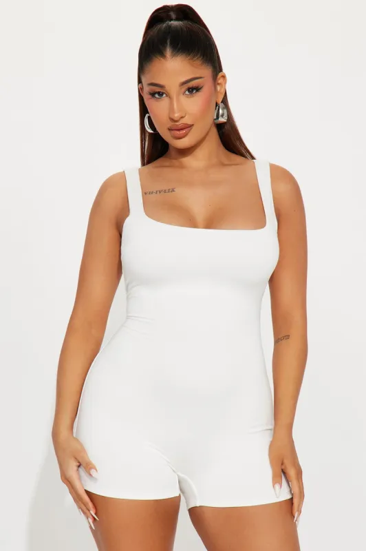 Cloud Nine Corset Top - Ivory/combo sold by Fashion Nova