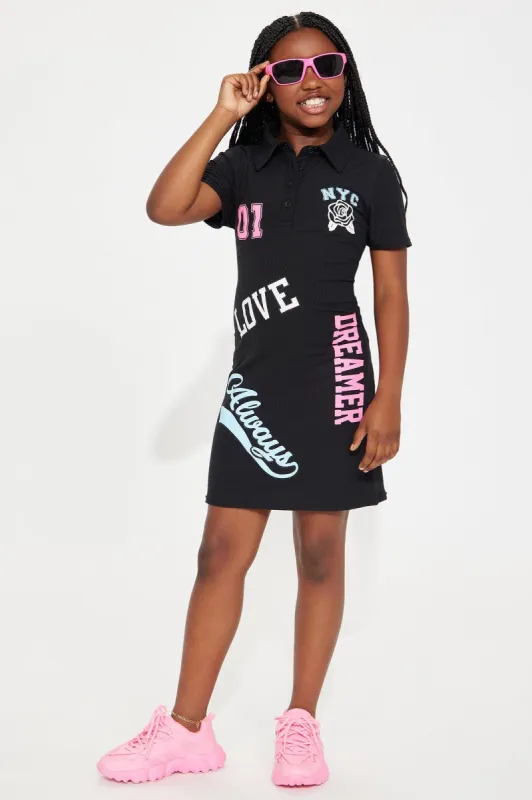 Mini Say It Loud Yummy Polo Dress - Black sold by Fashion Nova