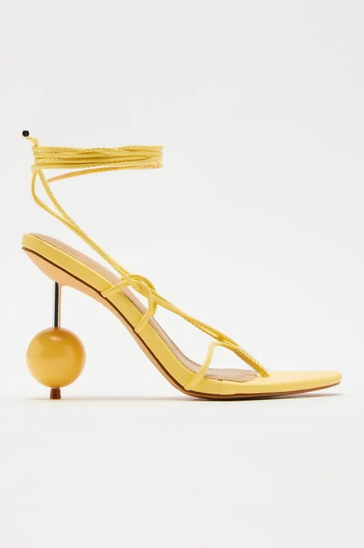 Having A Ball Wrap Up Heels - Yellow sold by Fashion Nova