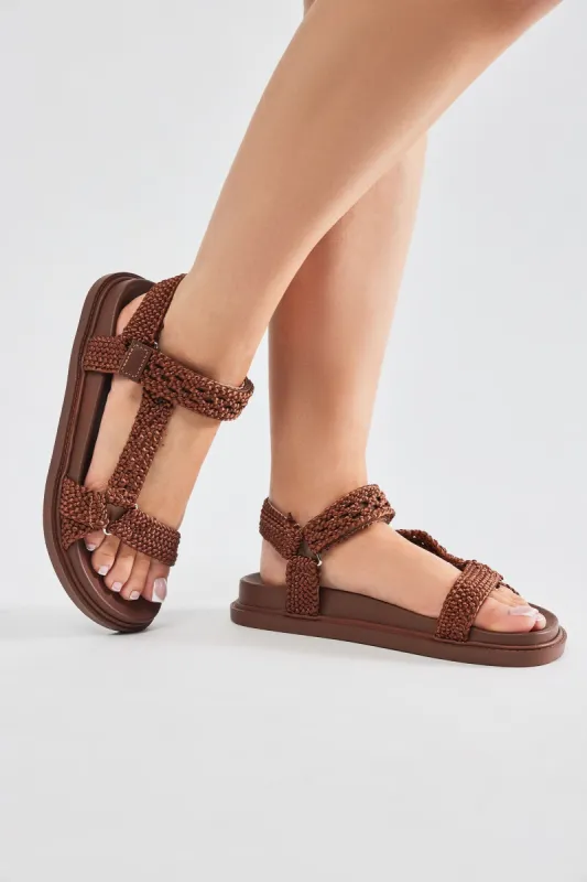 Ava Woven Strappy Flat Sandals - Brown sold by Fashion Nova