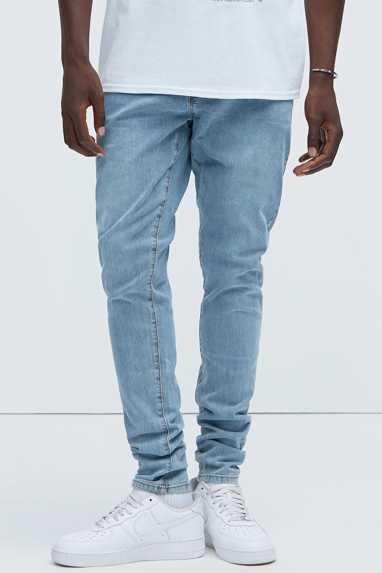 Cornell Stacked Skinny Jeans - Blue Wash sold by Fashion Nova