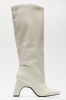 Late City Nights Knee High Heeled Boots - Cream sold by Fashion Nova