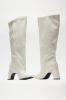 Late City Nights Knee High Heeled Boots - Cream sold by Fashion Nova