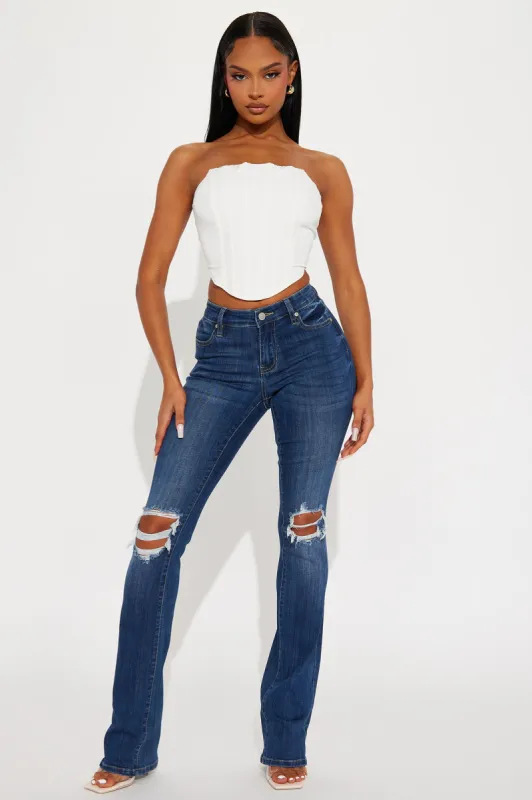 Tall Jessie Mid Rise Distressed Bootcut Jean - Medium Wash sold by Fashion Nova