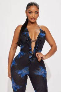 Catch Me If You Can Jumpsuit - Black/combo sold by Fashion Nova